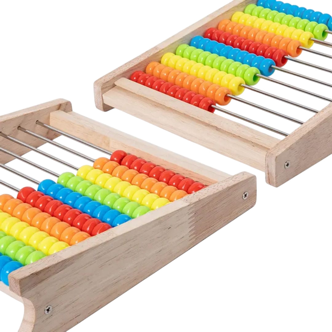 Boost Early Math Skills with Classic Wooden Abacus - 100 Beads Montessori Toy for Preschool Learning. The image displays a traditional wooden abacus with ten rows of ten beads each, in a rainbow of colors. Above the beads, there are three wooden squares displaying the numbers ‘1’ and ‘2’ separated by a plus sign, and an equal sign followed by the number ‘3’, illustrating a basic addition problem.