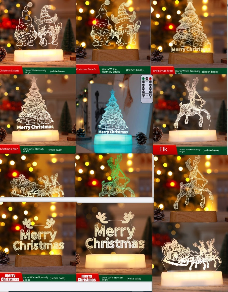 Illuminated Christmas LED lamps with a 'Merry Christmas' sign featuring reindeer antlers and a Christmas tree with presents underneath. The lamps glow warmly, set against a backdrop of a decorated Christmas tree with lights and ornaments. Pine branches and a pine cone add to the festive ambiance.