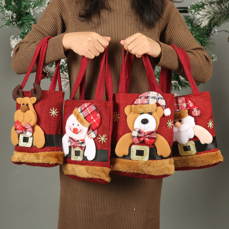 Festive Christmas Candy Gift Tote Bags featuring Santa Claus, Elk, Snowman, and Bear designs, perfect for kids' gifts and holiday decorations