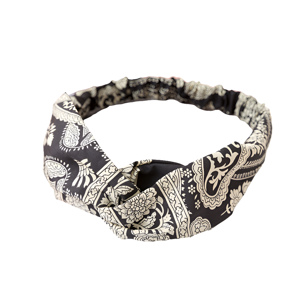 Ladies cross-knotted wide-brimmed headband with a fabric flower, perfect for adding a stylish and elegant touch to any outfit.