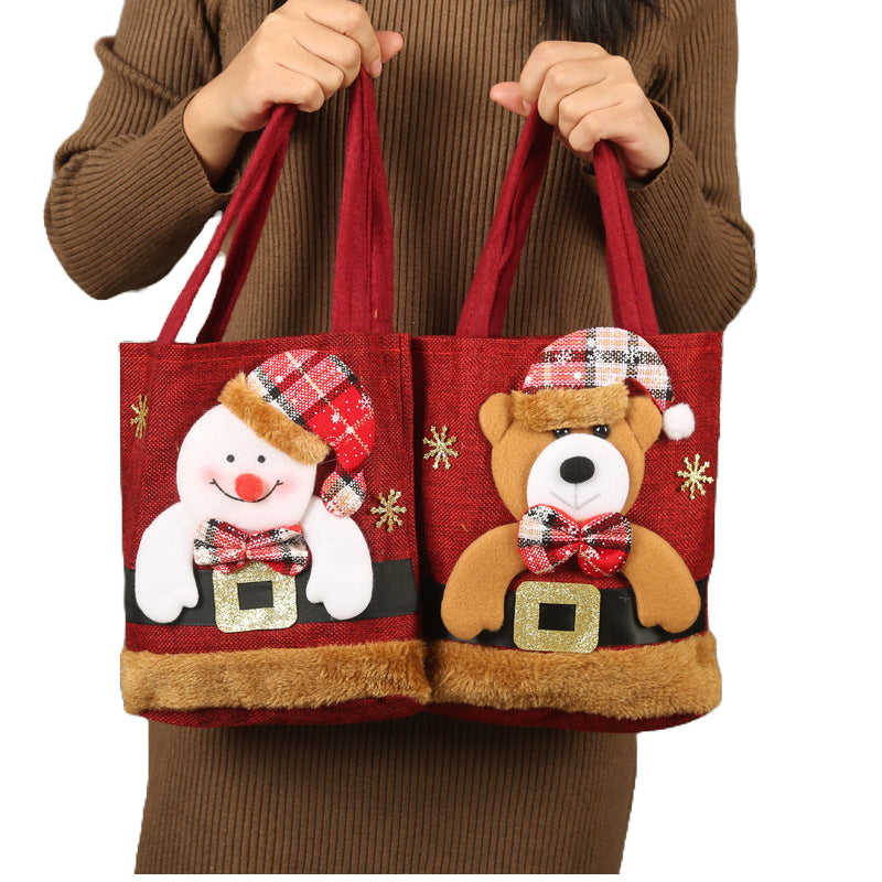Festive Christmas Candy Gift Tote Bags featuring Santa Claus, Elk, Snowman, and Bear designs, perfect for kids' gifts and holiday decorations