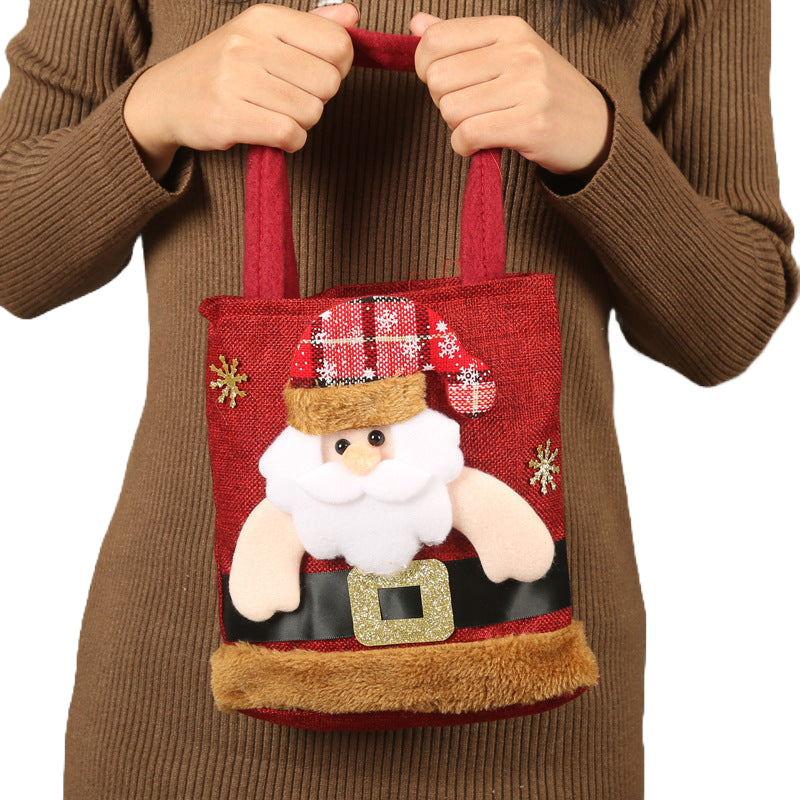 Festive Christmas Candy Gift Tote Bags featuring Santa Claus, Elk, Snowman, and Bear designs, perfect for kids' gifts and holiday decorations
