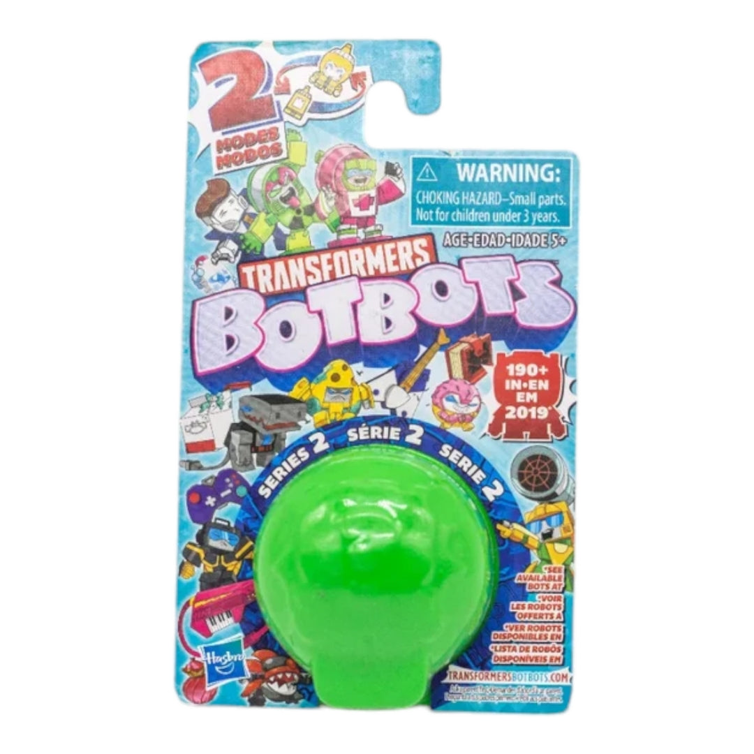 The image shows six Hasbro BOTBOTS Mini Transformers Blind Bags arranged in a star pattern. Each package features a different color (red, blue, green, orange, yellow) and contains a surprise mini transformer toy. The packaging is vibrant and eye-catching, making it an appealing gift for children.