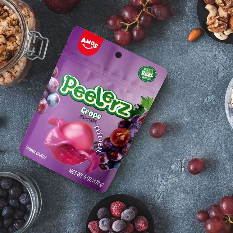 Amos Peelerz peelable grape gummy candy sold at Giggly Groves—fun jelly sweets for kids with vibrant purple packaging and realistic fruit peel texture.