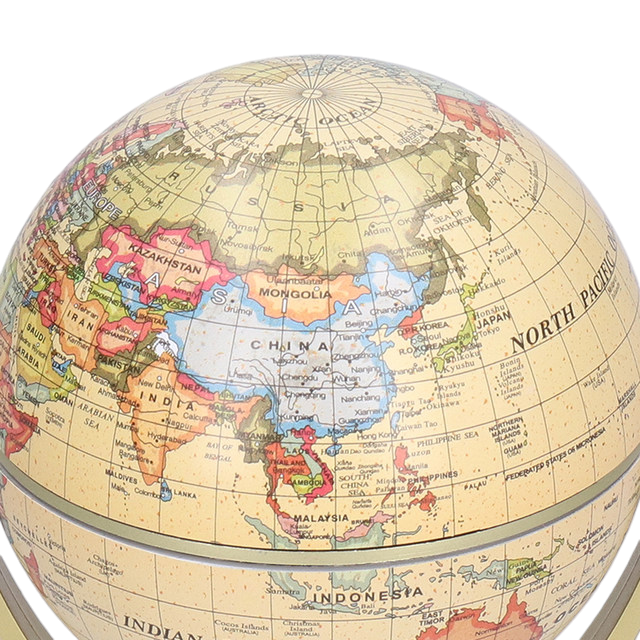 The image shows a small, desktop globe mounted on a golden stand. The globe displays a detailed world map with country names, borders, and major cities clearly marked. The globe is designed to rotate, making it a practical and educational tool for learning geography. The compact size and elegant design make it suitable for both educational purposes and as an office decor item.