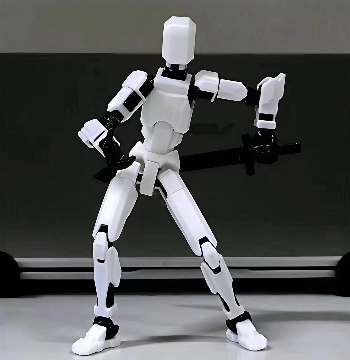 White robot figure on a gray background