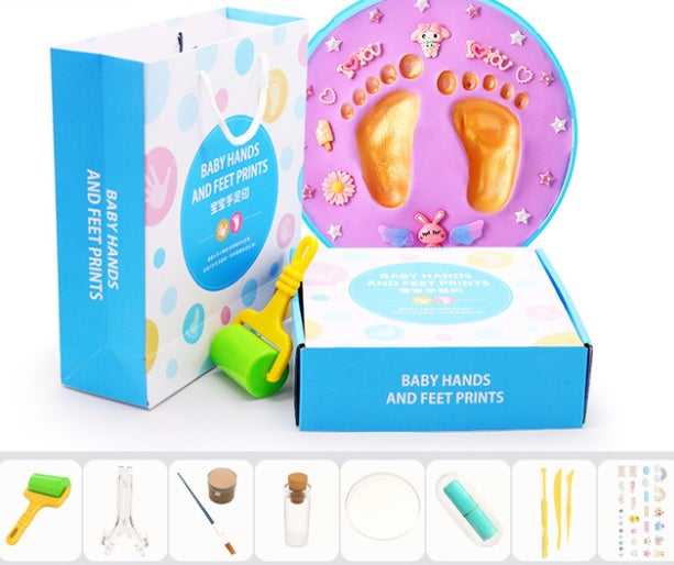 A vibrant set of baby hand and foot print mud or clay kits, designed for newborns, displayed with colorful plaques and decorative elements. Perfect for creating lasting keepsakes, this product is available exclusively on Giggly Groves Toy Website.