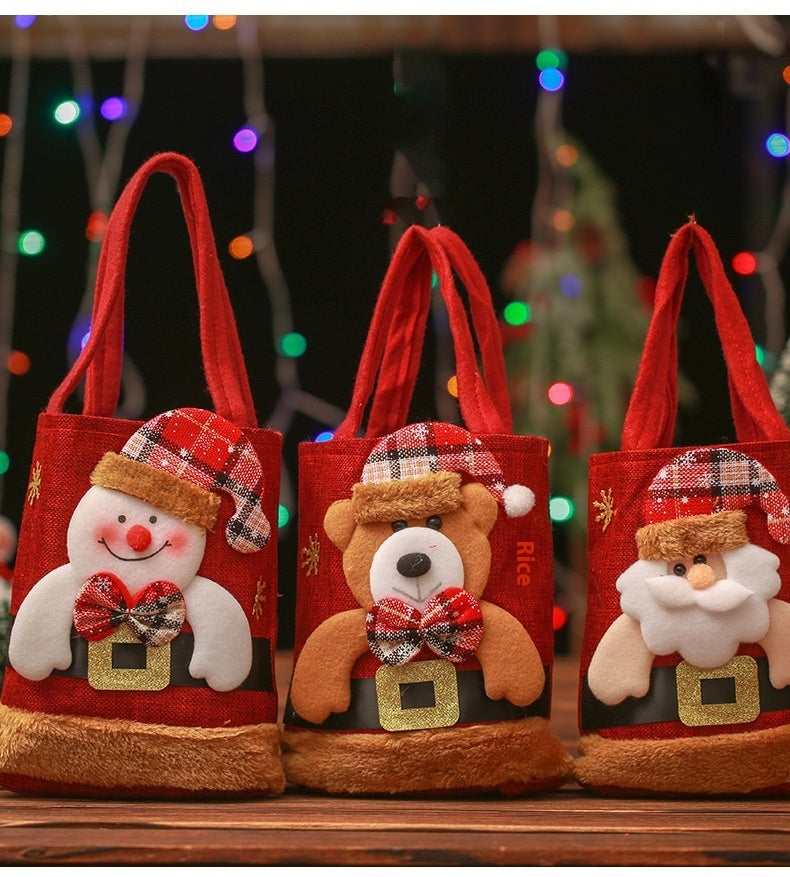 Festive Christmas Candy Gift Tote Bags featuring Santa Claus, Elk, Snowman, and Bear designs, perfect for kids' gifts and holiday decorations
