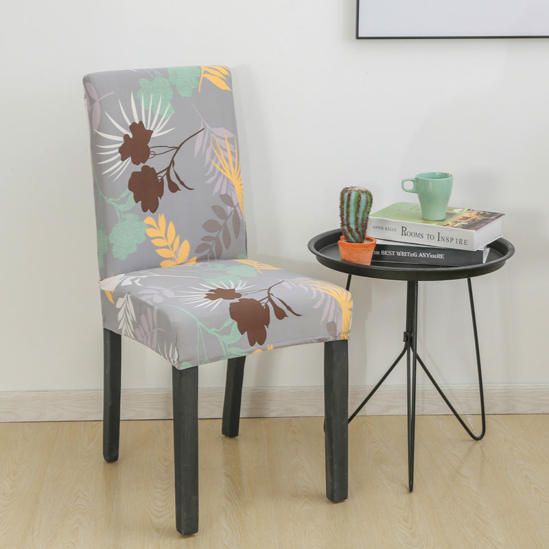 New Printed Elastic Chair Cover – Antifouling & Protective. Ideal for hotels and households. Available at Giggly Groves.