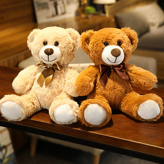 Giggly Groves 14-inch beige super soft teddy bear stuffed animal toy for kids with a shiny gold ribbon.