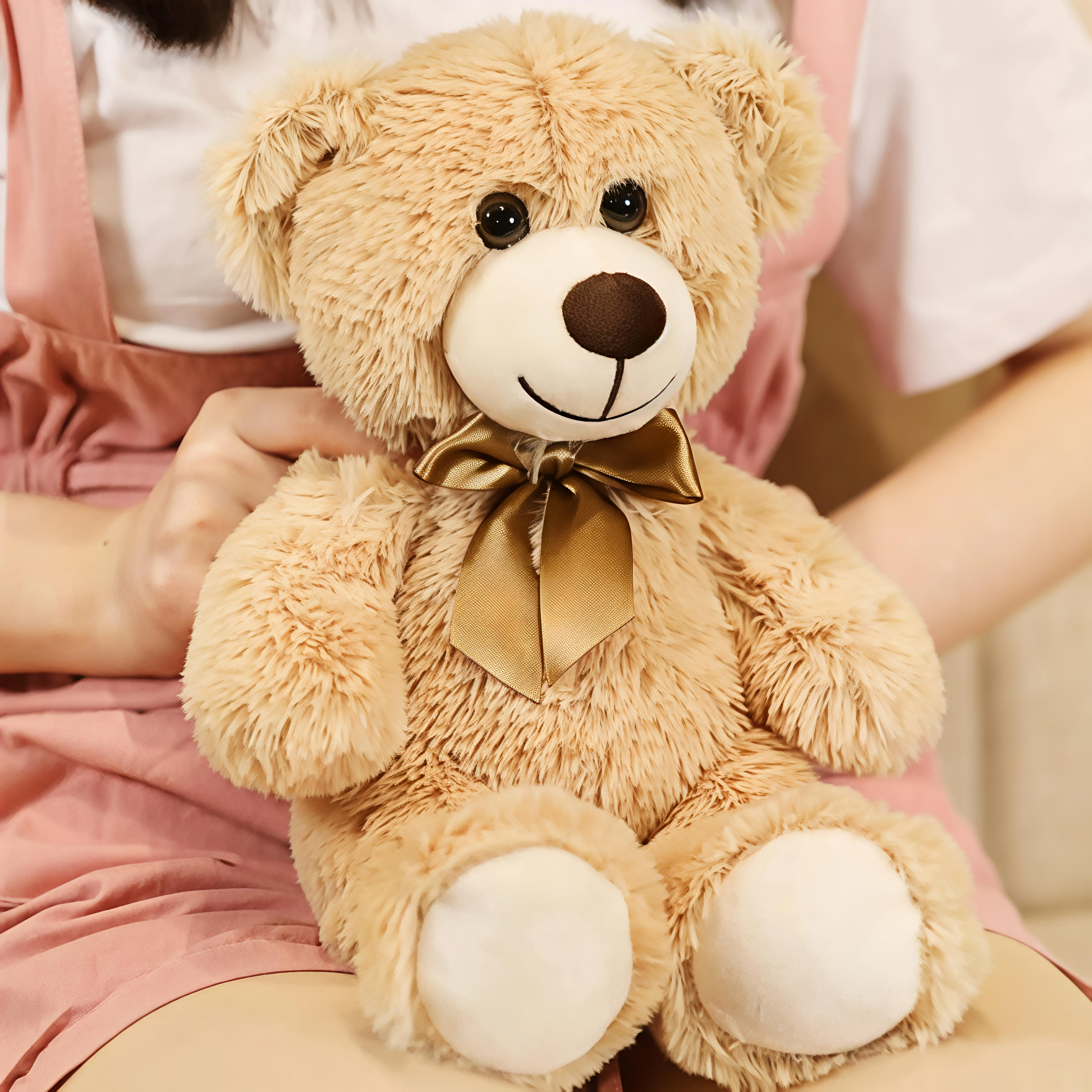 Giggly Groves 14-inch beige super soft teddy bear stuffed animal toy for kids with a shiny gold ribbon.