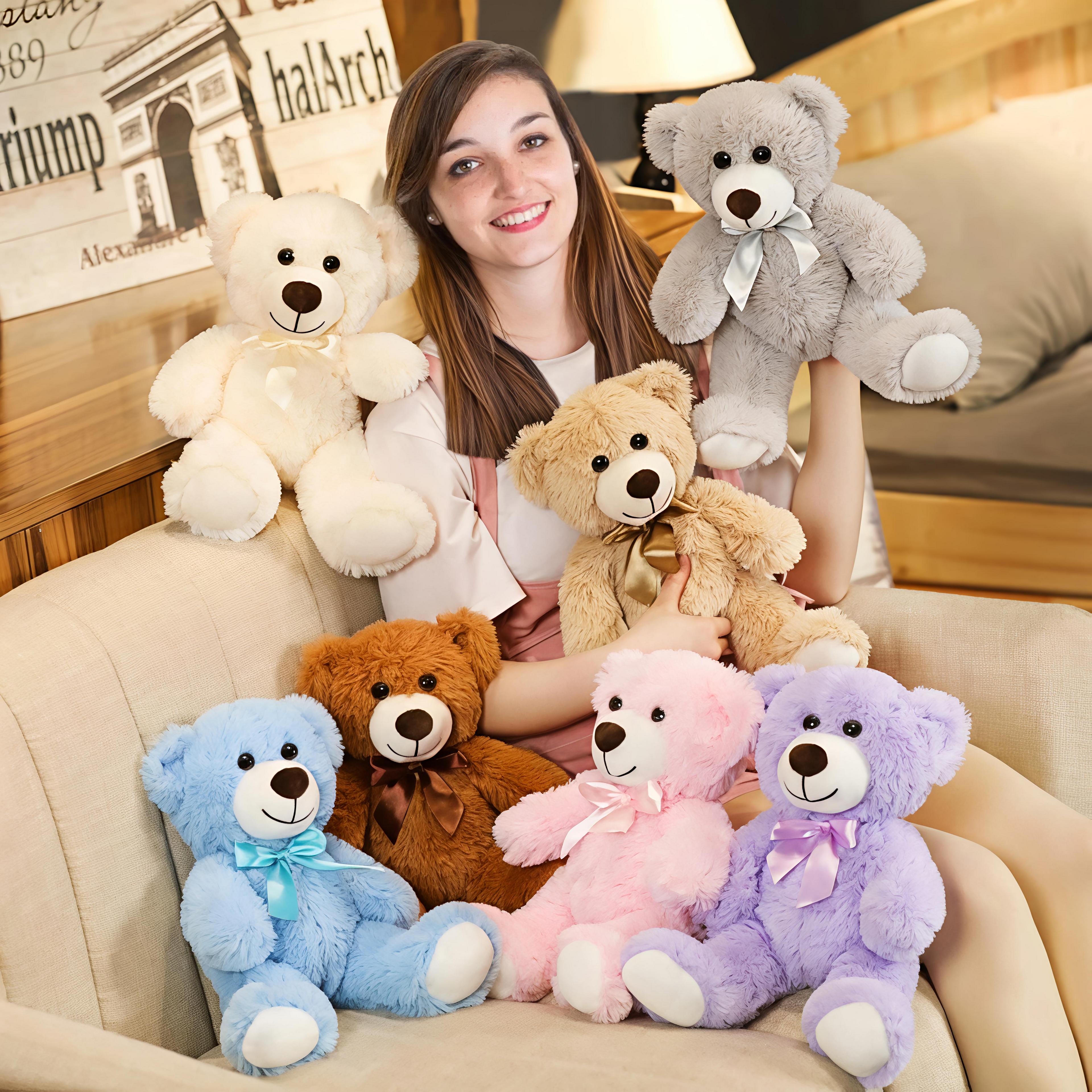 Giggly Groves 14-inch beige super soft teddy bear stuffed animal toy for kids with a shiny gold ribbon.
